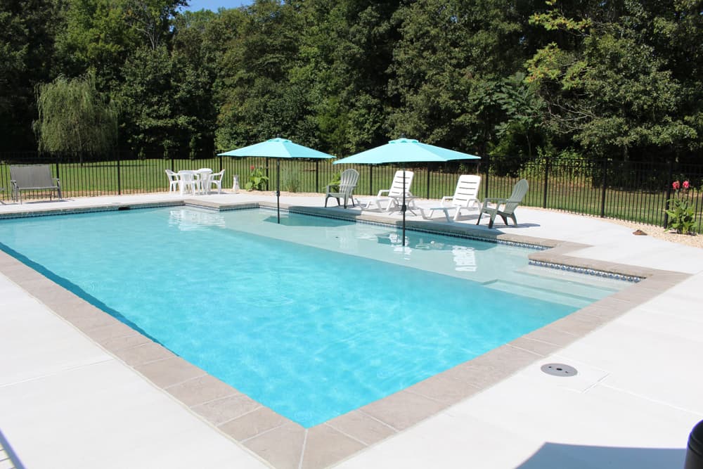 Swimming Pool with Sun Shelf | The Pool Company Construction