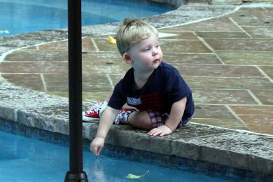 Swanson boy at poolside