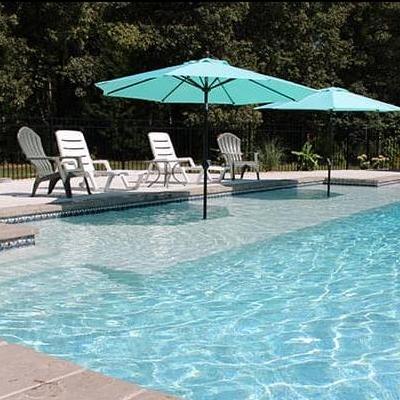 pool with wading area and patio