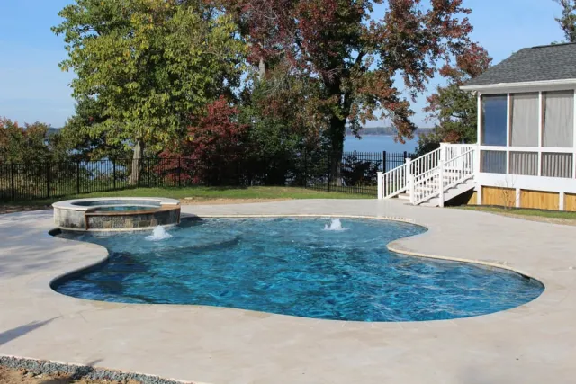 River View pool bubblers and spa beside the waterfront home