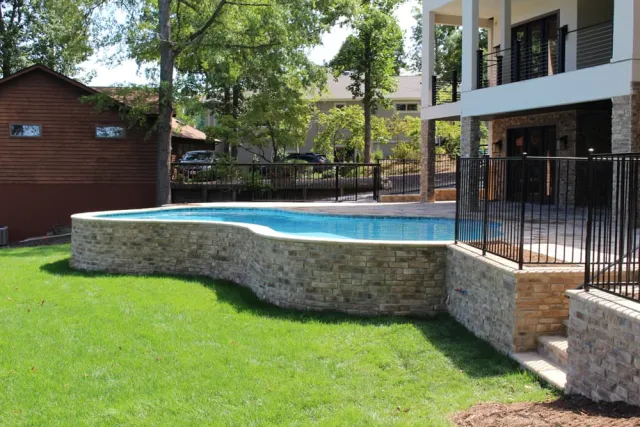 Lake of the Woods stone-faced outer wall and curved pool edge